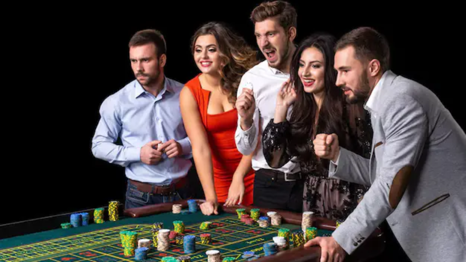 group-young-people-roulette-table-casino-black-background_639032-2836